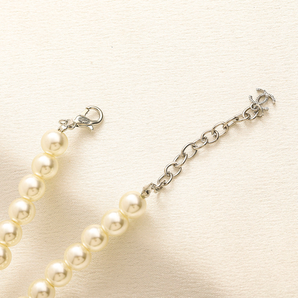 Set di Orecchini, Bracciale e Collana in Lega con Logo Stampato