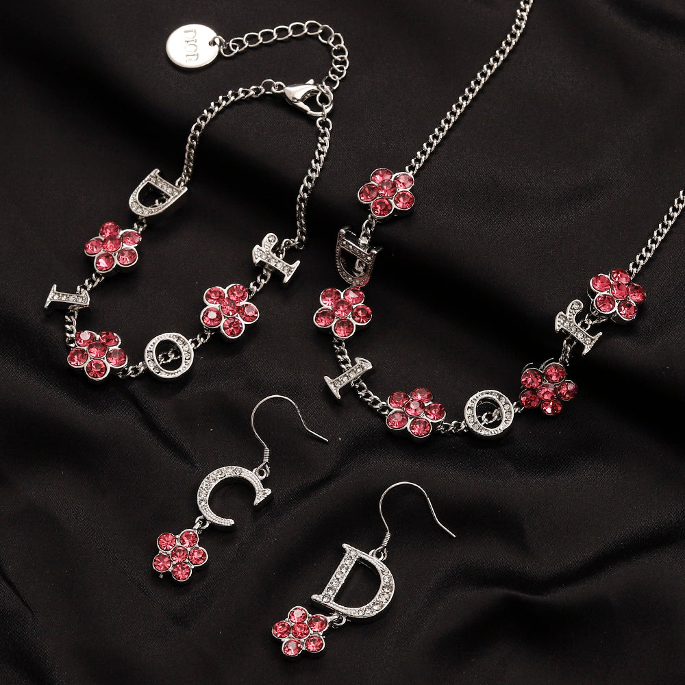 Set di orecchini, bracciale e collana in lega con logo stampato