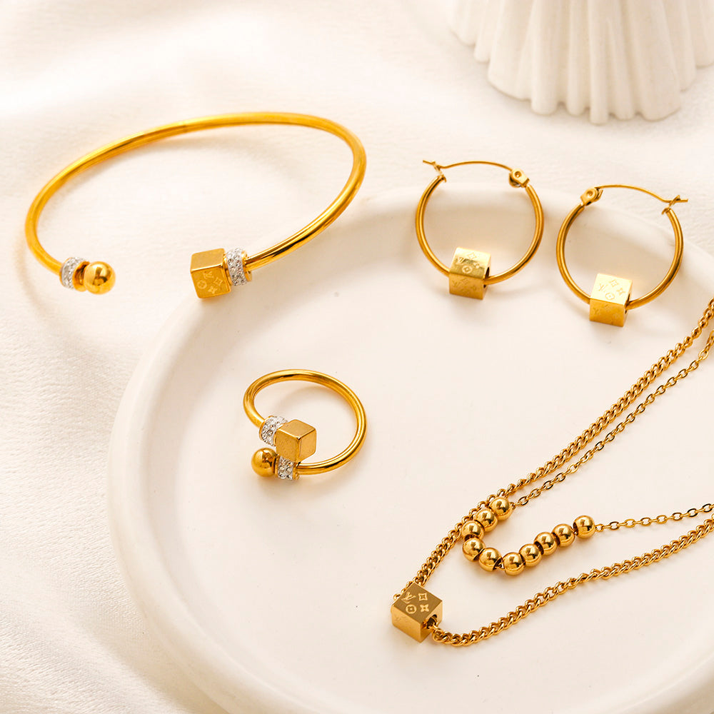 Set di anelli, orecchini, bracciale e collana in acciaio inossidabile 304