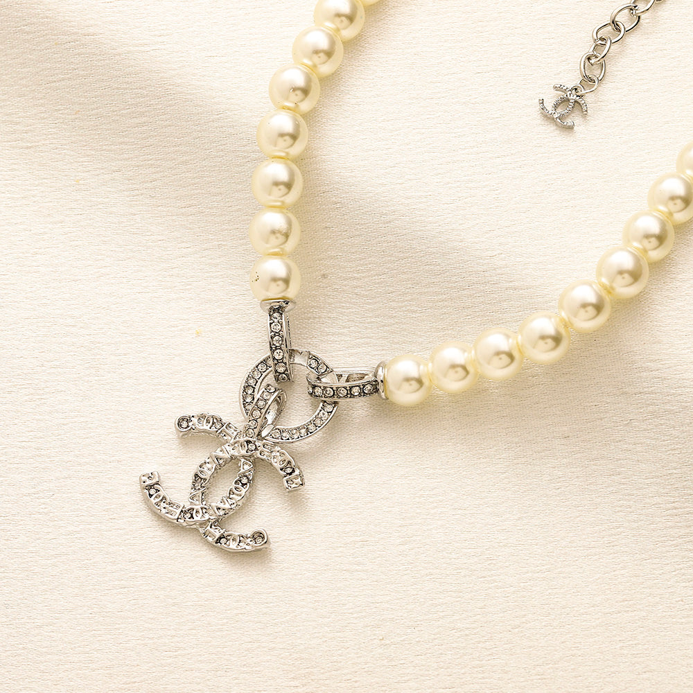 Set di Orecchini, Bracciale e Collana in Lega con Logo Stampato