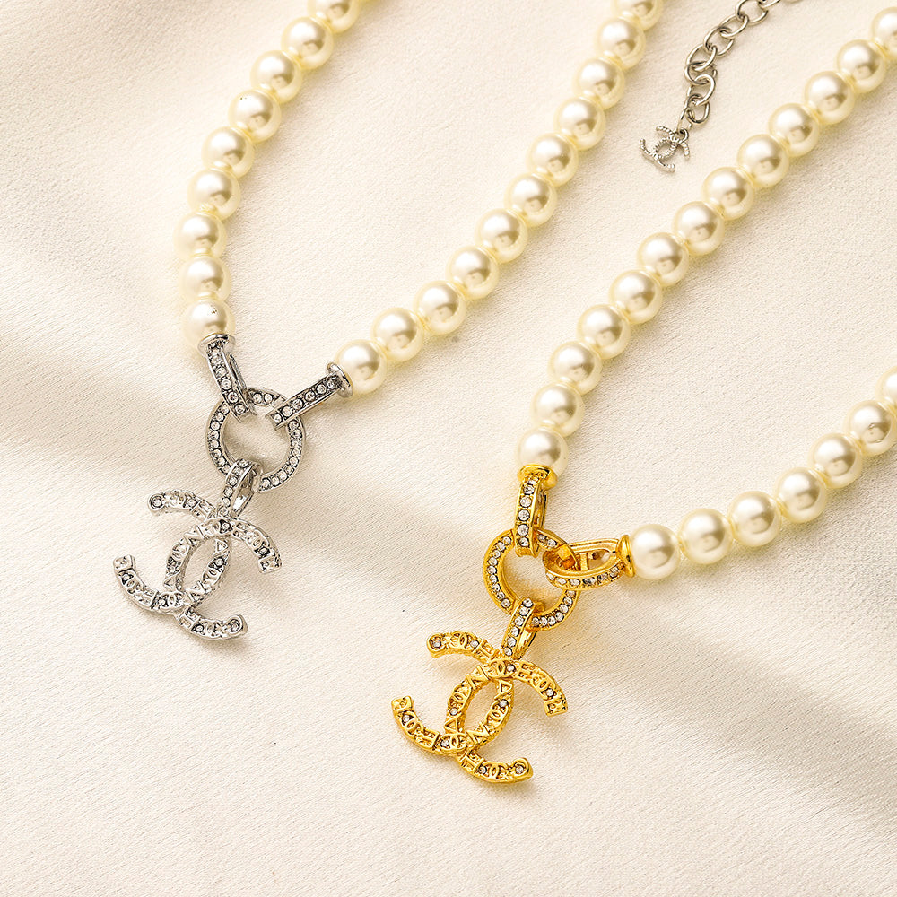 Set di Orecchini, Bracciale e Collana in Lega con Logo Stampato