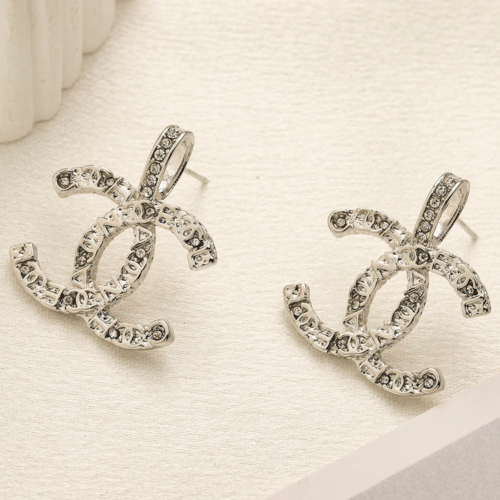 Set di Orecchini, Bracciale e Collana in Lega con Logo Stampato