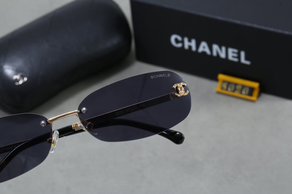 Slim Oval Sunglasses with Metal Rims