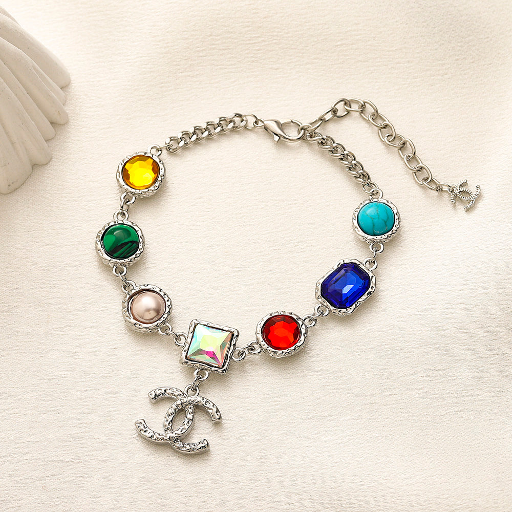 Set di collana e bracciale in lega con logo impresso