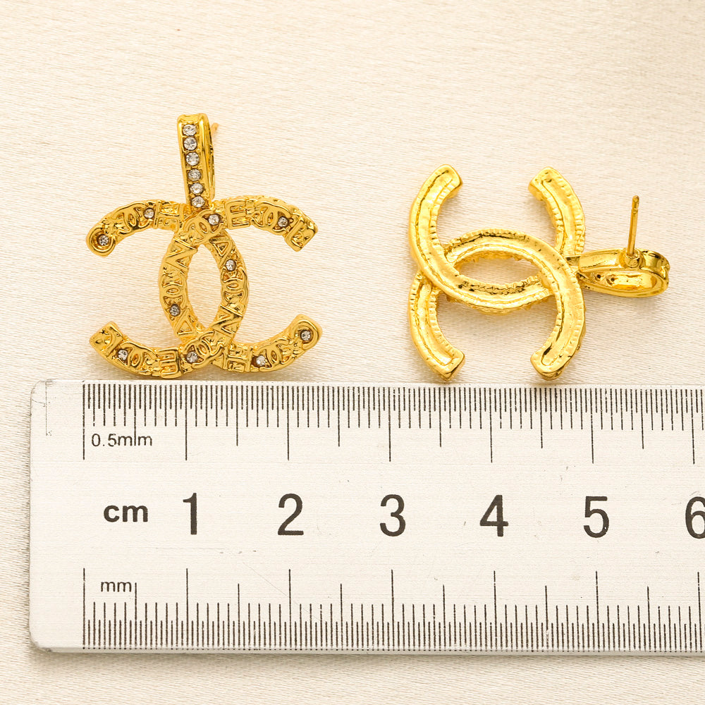 Set di Orecchini, Bracciale e Collana in Lega con Logo Stampato