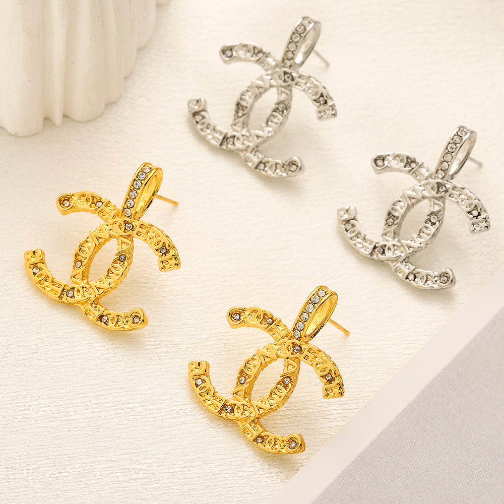 Set di Orecchini, Bracciale e Collana in Lega con Logo Stampato