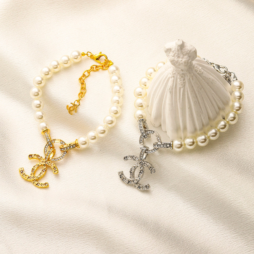 Set di Orecchini, Bracciale e Collana in Lega con Logo Stampato