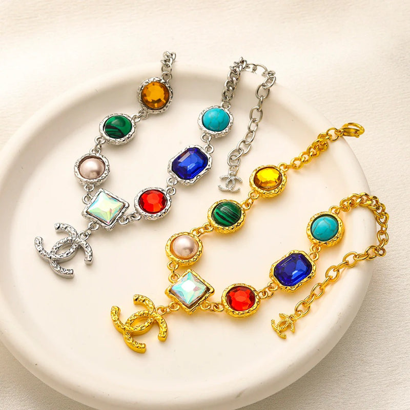 Set di collana e bracciale in lega con logo impresso