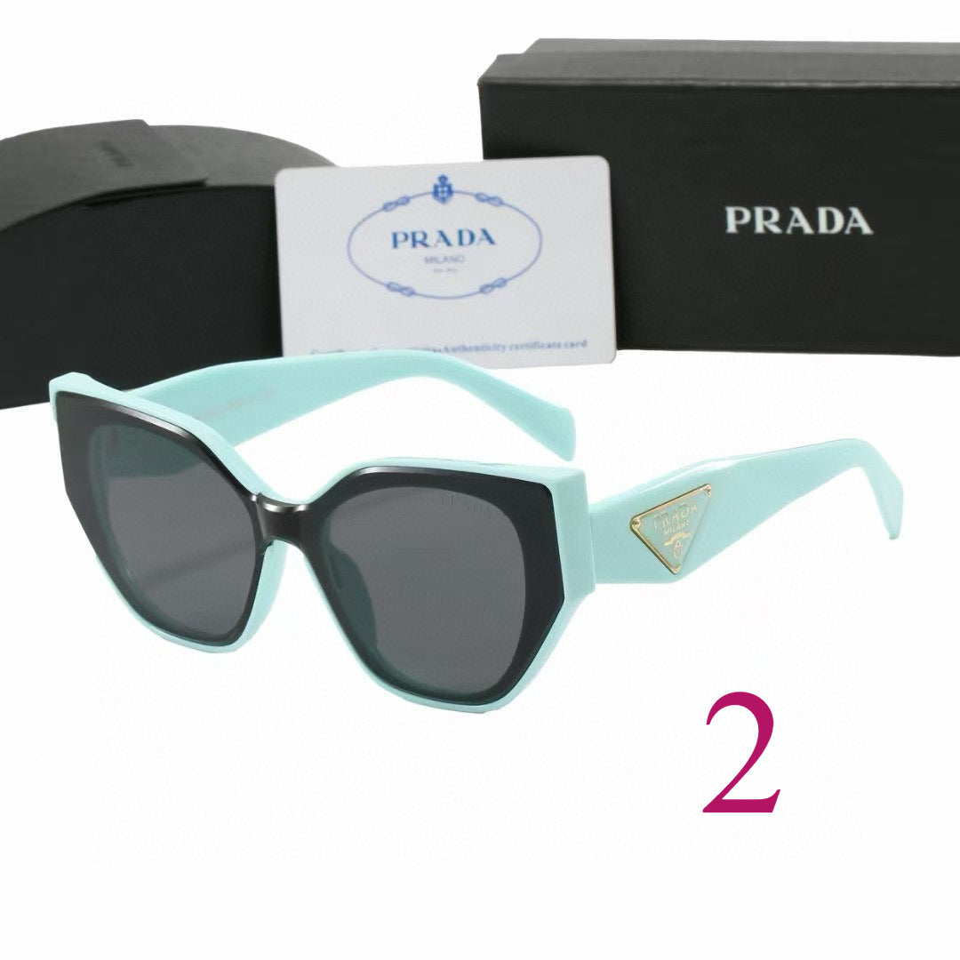 Rounded Cat-Eye Sunglasses with Ornate Patterned Temples