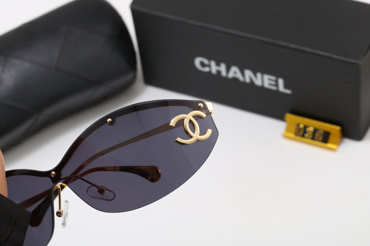 Slim Oval Sunglasses with Metallic Temple Accents