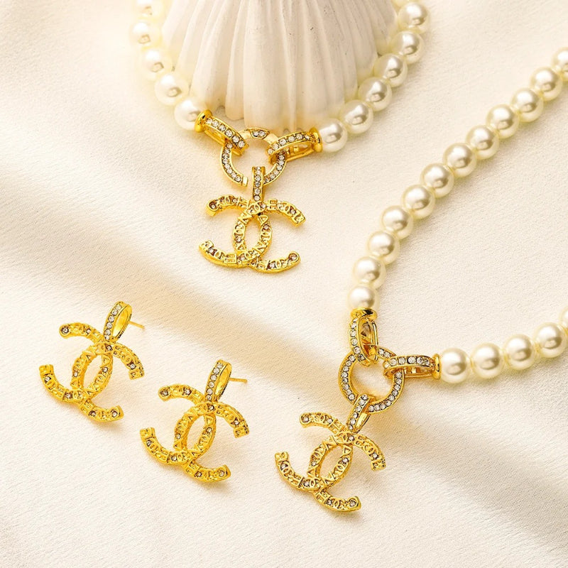 Set di Orecchini, Bracciale e Collana in Lega con Logo Stampato