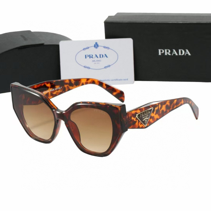 Rounded Cat-Eye Sunglasses with Ornate Patterned Temples
