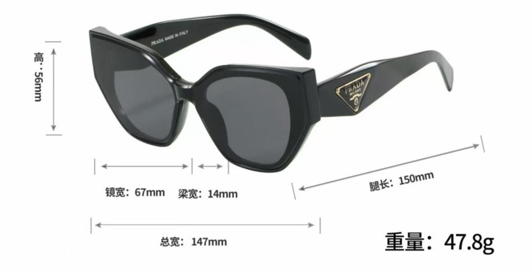 Rounded Cat-Eye Sunglasses with Ornate Patterned Temples